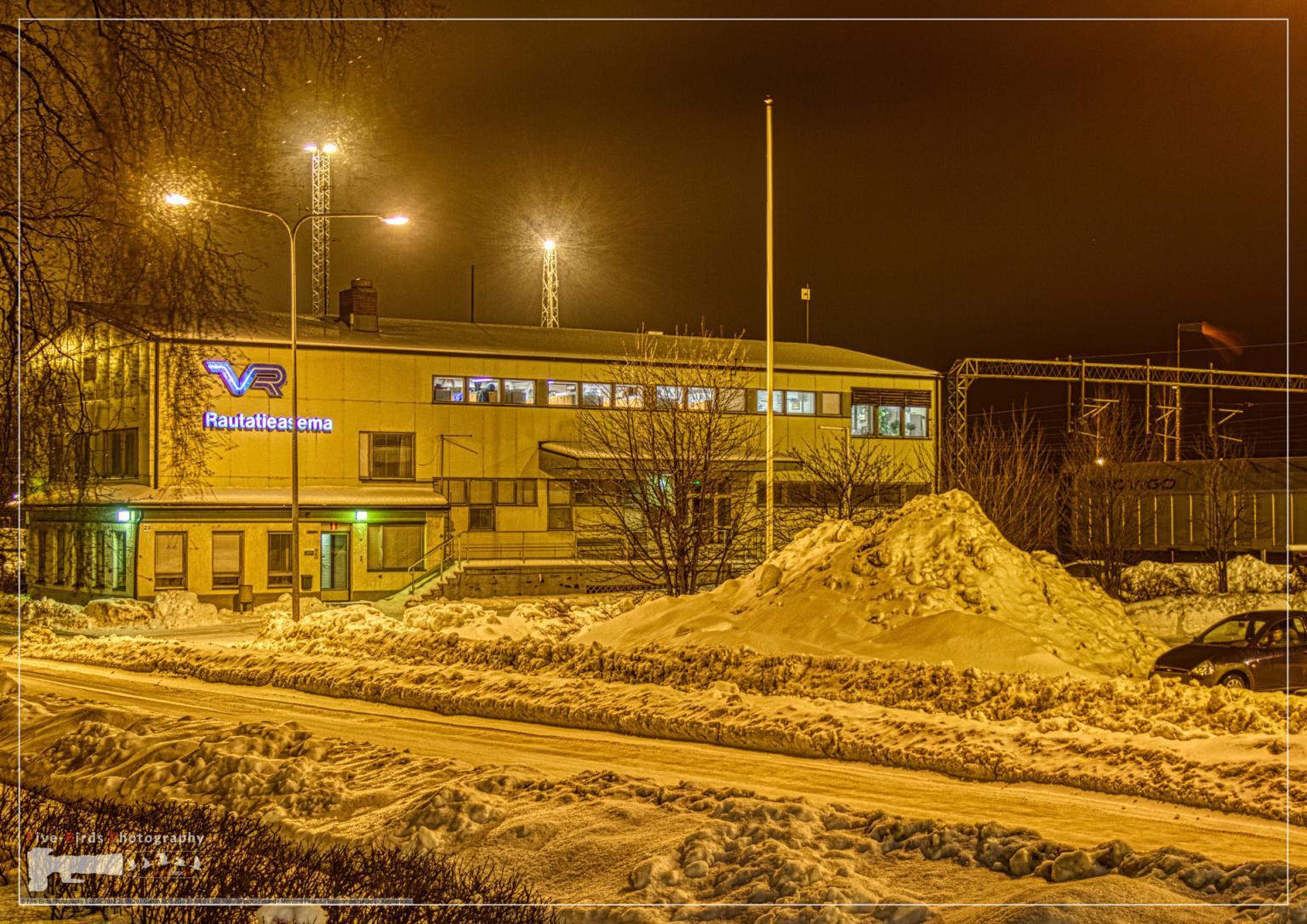 Night shot of a freight train station in Rauma, Finland