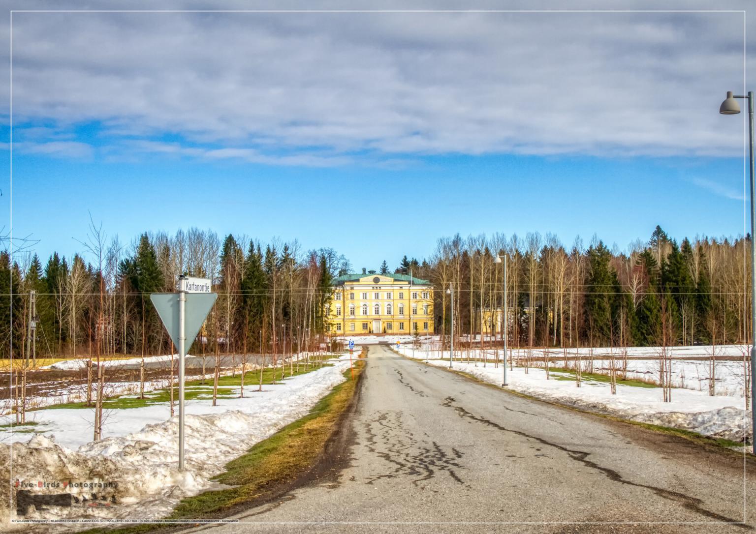 The manor house of Vuojoki in Finland in a beautiful winter landscape